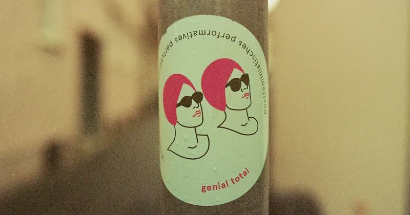 white and black labeled bottle